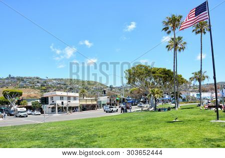 LAGUNA BEACH, CALIFORNIA - MAY 28, 2019: Pacific Coast Highway at Ocean Avenue in the popular Southern California beachtown.