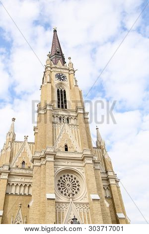 The Name Of Mary Church, Novi Sad Catholic Cathedral During A Spring Partly Cloudy Day.