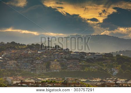 Idyllic Hilly Landscape With Houses And Cloudy Sky Over Sunset. Montesilvano, Italy.