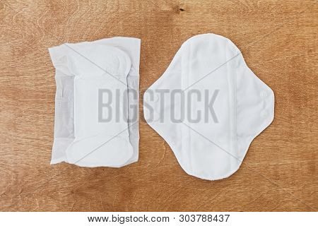 Reusable Eco Pad And Single Use Toxic Pad For Menstrual Days, Flat Lay. Chose Feminine  Healthy And