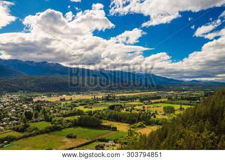 The Green Valley Of El Bolson In Argentinian Patagonia. The Andes And The Forest