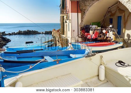 Colourful Boats In Tiny Marina Of Riomaggiore, The Largest Of The Five Centuries-old Villages Of Cin