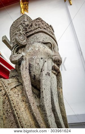 Chinese Guard Statue In Wat Pho Buddhist Temple, Bangkok, Thailand