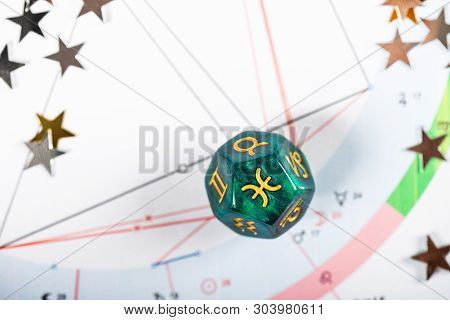 Astrology Dice With Zodiac Symbol Of Pisces Feb 19 - Mar 20 On Natal Chart Background