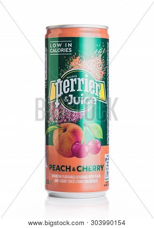 London, Uk - May 29, 2019: Aluminium Can Of Perrier And Juice With Peach And Cherry Flavour On White