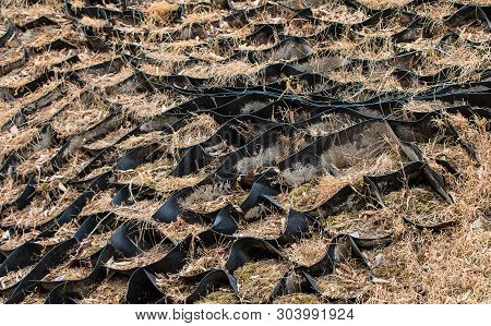 Strengthening Of An Earth Slope. Alignment, Strengthening Of A Landscape With The Punched Rubber