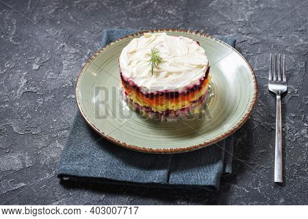 Russian Traditional New Year Salad Herring Under Fur Coat Shuba On Black Stone Table