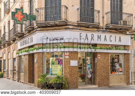 Llucmajor, Spain; Decemeber 17 2020: Front Of A Pharmacy In The Town Of Llucmajor, Island Of Mallorc