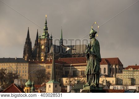Prague, Czech Republic. 01-11-2021. Statue Of John Of Nepomuk On Charles Bridge By Mathias Rauchmull