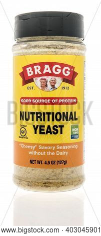 Winneconne, Wi -9 January 2021: A Package Of Package Of Bragg Nutritional Yeast On An Isolated Backg