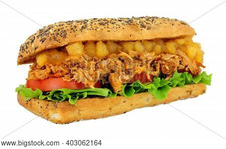 Slow Cooked Shredded Pork Sandwich In A Multigrain Topped Bread Roll With Chunky Bramley Apple Sauce