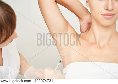 Underarm Injection At Spa Salon. Doctor Hands. Female Patient. Beauty Treatment. Healthy Skin Proced