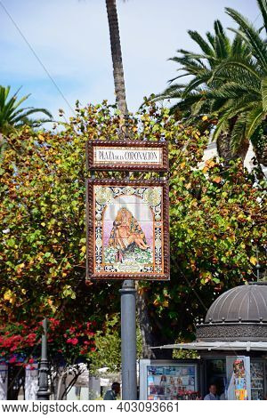 Ayamonte, Spain - June 11, 2017 - Ceramic Sign Depicting Mary Holding The Crucified Jesus, Coronatio