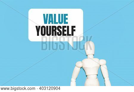 The Wooden Man And White Cloud With Text Value Yourself. The Content Of The Lettering Has Implicatio