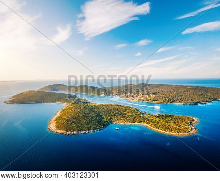Incredible view of Ilovik island from Losinj island. Location Kvarner Gulf, Croatia, Europe. Aerial photography, drone shot. Photo wallpaper. Luxury vacation concept. Discover the beauty of earth.