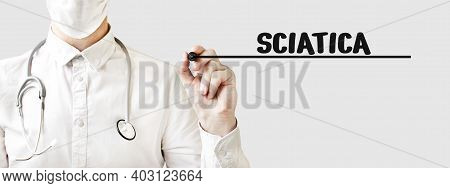 Doctor Writing Word Sciatica With Marker, Medical Concept