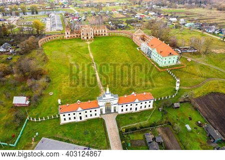 Ruzhansky Palace And The Ruins Of The Facade Of An Abandoned Ruined Building Of An Ancient Castle Of