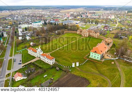 Ruzhansky Palace And The Ruins Of The Facade Of An Abandoned Ruined Building Of An Ancient Castle Of