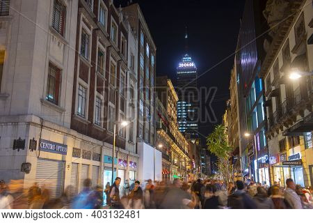 Historic Buildings On Avenida Francisco Madero And Torre Latinoamericana At Night In Mexico City Cdm