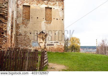 Ruzhansky Palace And The Ruins Of The Facade Of An Abandoned Ruined Building Of An Ancient Castle Of