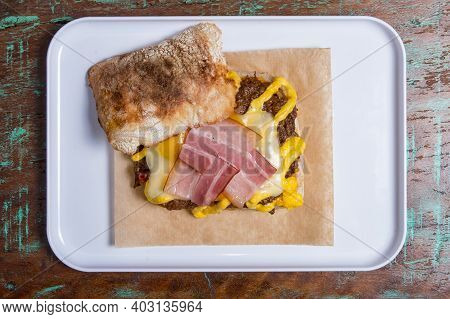 Ciabatta Baguette Sandwiches With Bacon, Cheese,  And Vegetales.