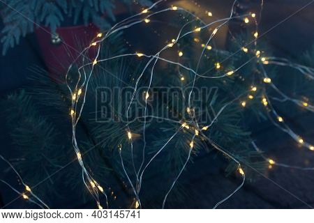 Decoration With Led Lights On Christmas Tree. Photo Taken Through Window.