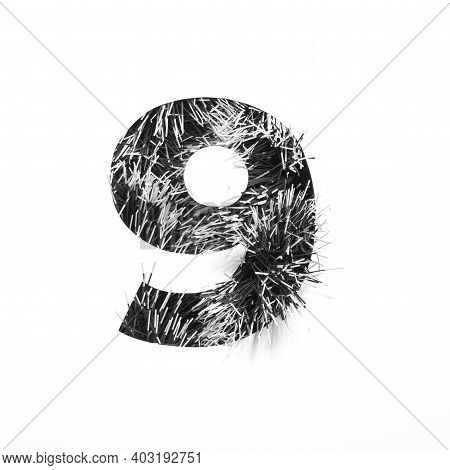 Black Number Nine Made Of Tinsel And Paper Cut Shape Of Ninth Numeral Isolated On White. Monochrome 