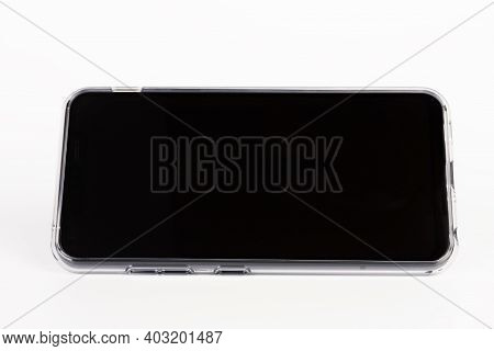 Touchscreen Smartphone In Silicone Cover In White Background.