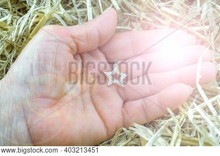 Background Religious Prayer , Hands Of A Woman Holding A Silver Star Of David