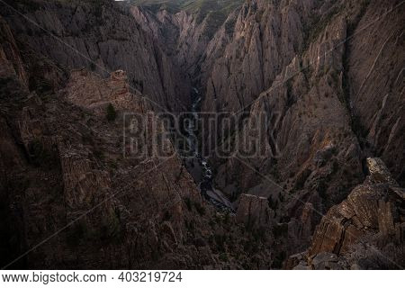 Distant Gunnison River In Canyon From Overlook In Colorado National Park