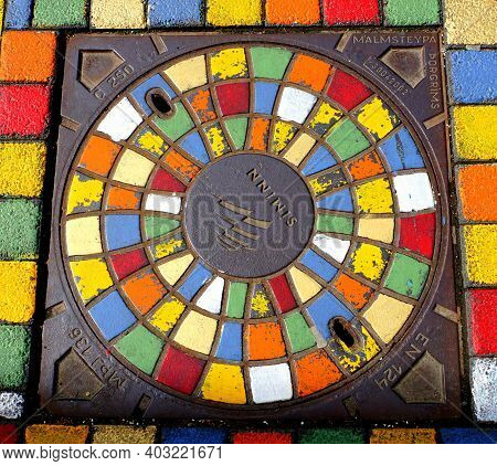 Reykjavik, Iceland - June 20, 2019 - The Colorful Utility Hole On A Street In The City