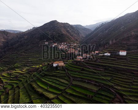 Aerial Panorama Of Green Agriculture Farming Terraces Old Remote Rural Mountain Village Town Porta C