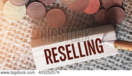 Reselling Word Written On Wooden Building Block And Euro Coins Around. Trading Reselling Retail Busi