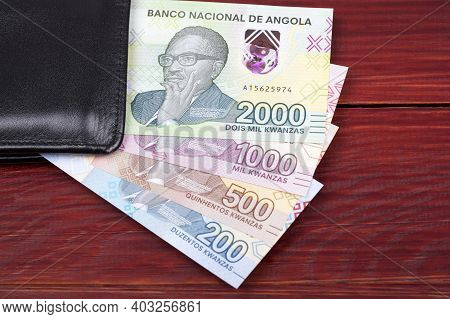 Angolan Money - Kwanza A New Series Of Banknotes In The Black Wallet