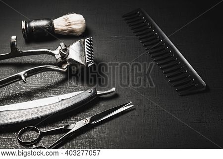 Vintage Barber Tools. Dangerous Razor, Hairdressing Scissors, Old Manual Clipper, Combs, Shaving Bru
