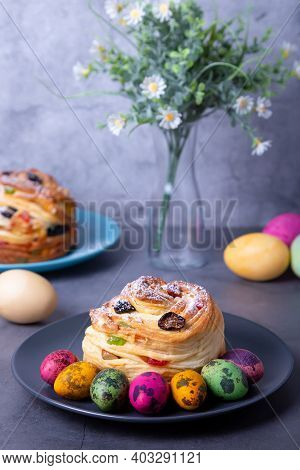 Craffin (cruffin) With Raisins, Nuts And Candied Fruits. Easter Bread Kulich And Painted Eggs. Easte