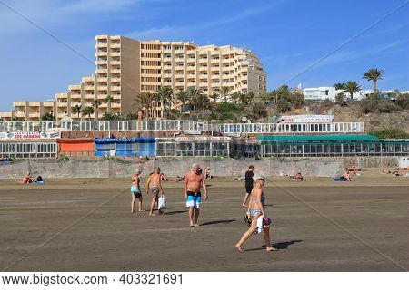 Playa Ingles, Spain - December 1, 2015: People Visit Playa Ingles Beach In Maspalomas, Gran Canaria,