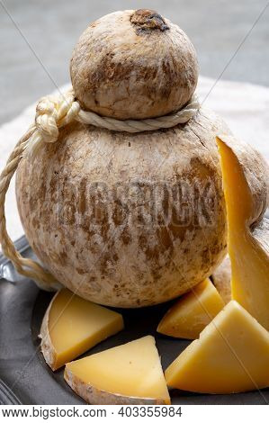 Italian Semi Hard Matured Caciocavallo Cheese, Handmade And Aged In Natural Underground Caves In Apu