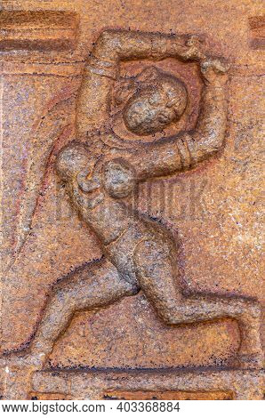 Hampi, Karnataka, India - November 5, 2013: Vijaya Vitthala Temple. Red Stone Fresco Of Dancing Woma