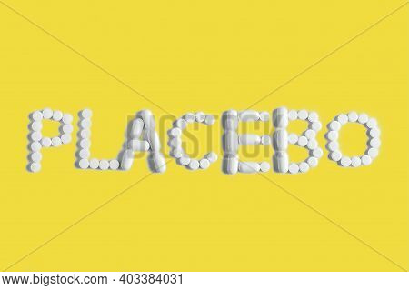 Placebo Is A Medical Concept In Trendy Colors. The Tablets Are Lined With The Word Placebo.ultimate 