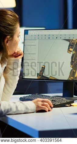 Tired Woman Architect Working On Modern Cad Program Overtime Sitting At Desk In Start-up Office. Ind
