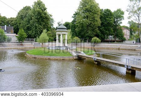Pavilion In The Center Of A Pond  In The City Park Of Liepaja In Latvia On A Sunny Summer Day