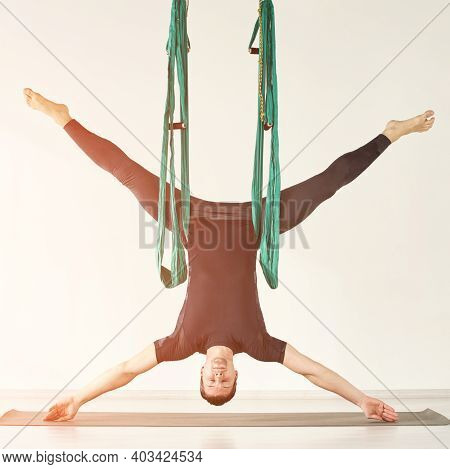 Male Person Do Hammock Yoga Class Exercise. Meditation In Air Calm. Aero Beginner Studio Workout. Ma