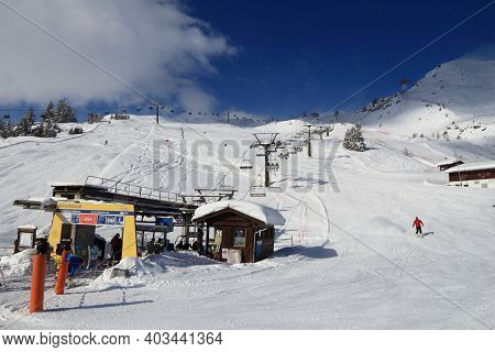 Bad Hofgastein, Austria - March 9, 2016: People Ride A Ski Lift In Bad Hofgastein. It Is Part Of Ski