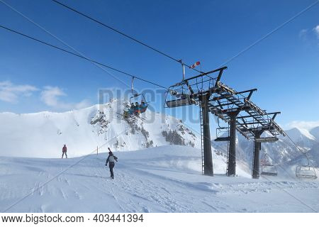 Bad Hofgastein, Austria - March 9, 2016: People Ride A Ski Lift In Bad Hofgastein. It Is Part Of Ski