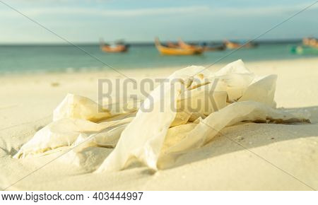 Plastic Bags On The Beach That Pollute Marine Animals And The Environment,used White Plastic Bags Wa