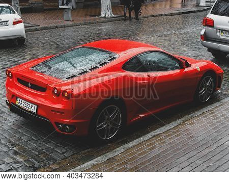 Kiev, Ukraine - April 10, 2011: Red Supercar Ferrari F430 In Raindrops. Ferrari In The City