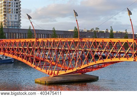 Red Python Bridge Pillar Structure In Amsterdam Netherlands
