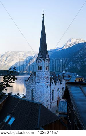Church In Hallstatt At Sunset. Austrian Alps.