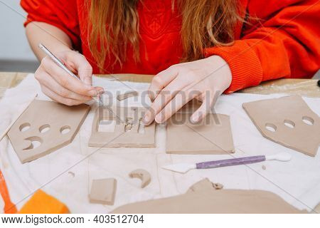 Womens Hands Knead Clay, Drawing Elements Of The Product. Production Of Ceramic Products At The Mast
